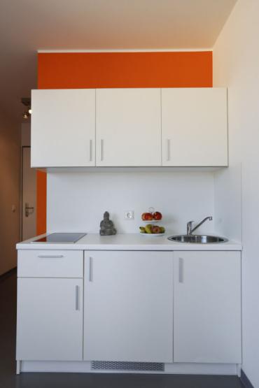 Kitchenette, with fridge in the bottom middle