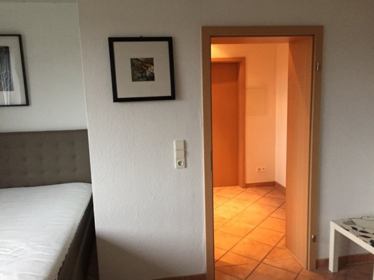 Wohnraum mit Boxspringbett