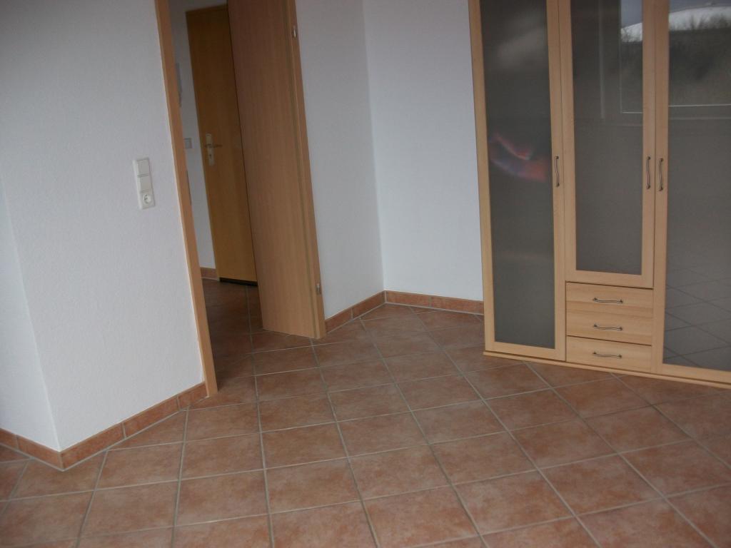 Wohnung Erle Wirknerstrasse 15 - Wohnraum mit Schrank