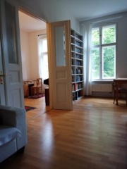 Ad image: Two bright rooms in a flat with a grand piano
