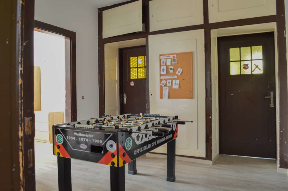 WG-Zimmer Österberg Schwabstraße 16 - Zwischenzimmer mit Tischkicker