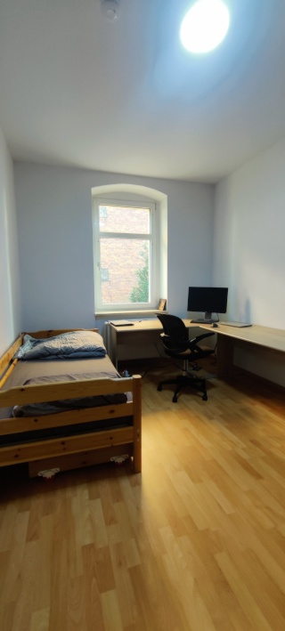 Ad image: One fully-furnished room in a two shared apartment.