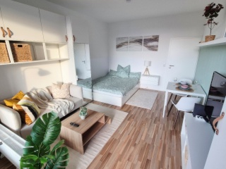 Anzeigenbild: Möbliertes Apartment direkt am Hbf Augsburg mit großem Westbalkon in ruhiger Lage