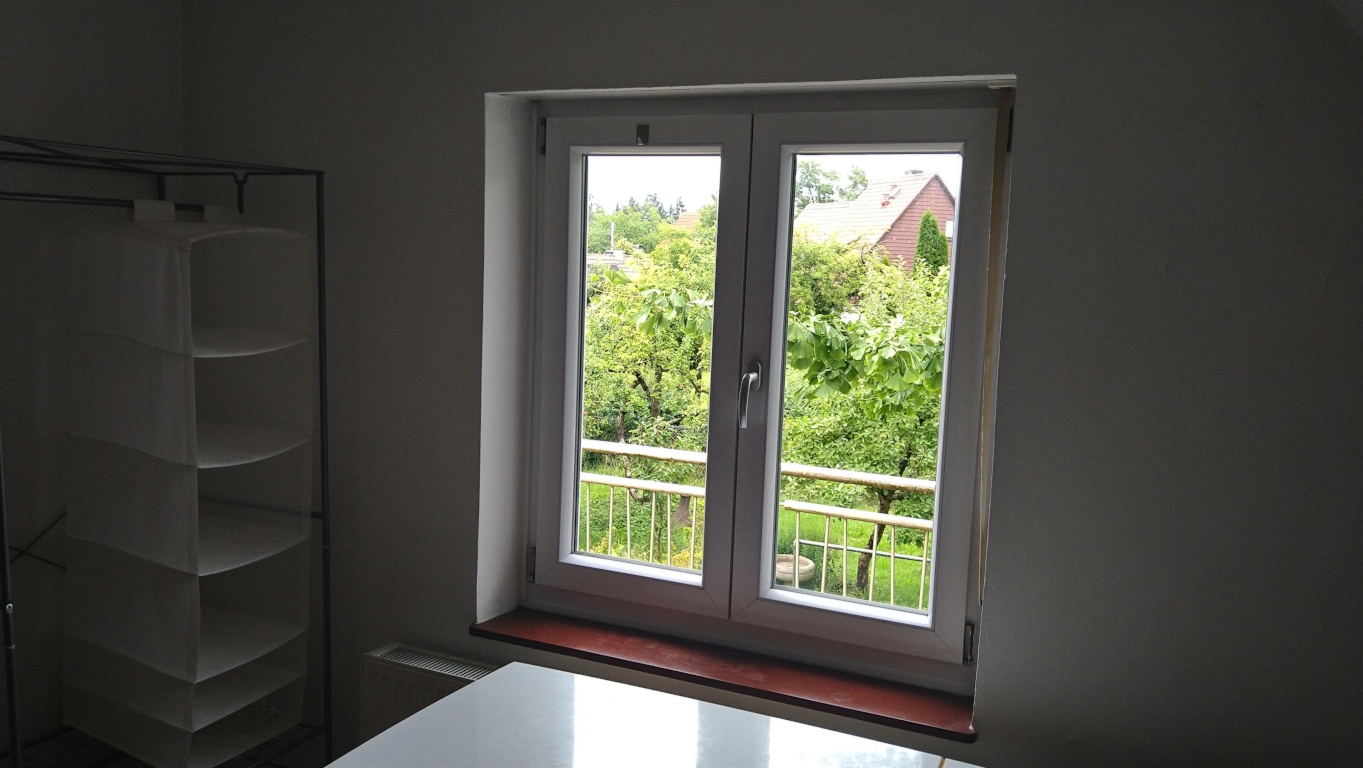 WG-Zimmer Aschheim Lerchenweg - Blick in den Garten