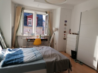 Ad image: bright room in sympathetic city-WG