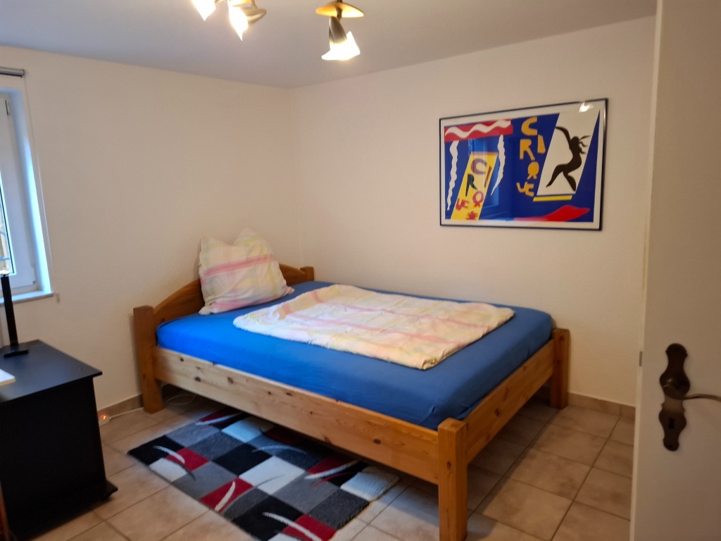 Habitación en WG Flughafen Amselweg 12 - Bed