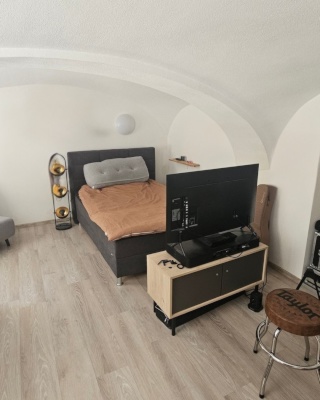 Ad image: Blick in den grünen Innenhof aus deinem WG-Zimmer im Herzen der Passauer Altstadt