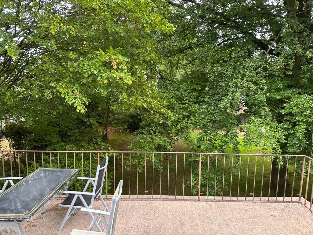 WG-Zimmer Zeppelinheim Mathilde-Rösch-Straße 5 - Vom Balkon blickt man in den Garten des Hauses runter