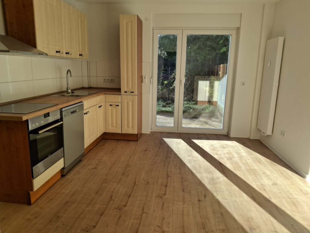 WG-taugliche 2-Zimmer-Terrassenwohnung (66 qm) mit Einbauküche und Gartenanteil, im modernisierten Altbau