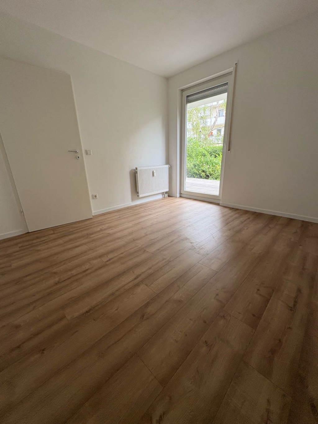 Flat Nordtadt Bienweg - Schlafzimmer mit Terrassenzugang