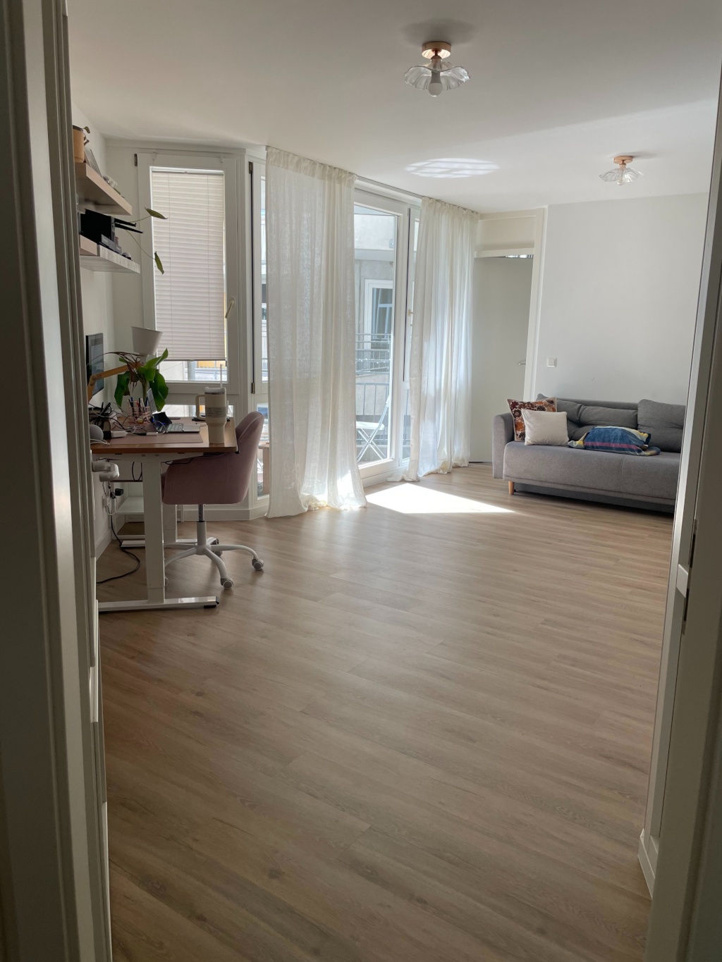 Apartamento Weißensee Am Steinberg - living room (view from entry hallway)