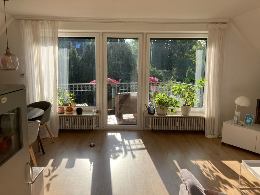 Flat Niendorf Hildesheimerweg 16a - Wohnzimmer mit Blick ins Grüne