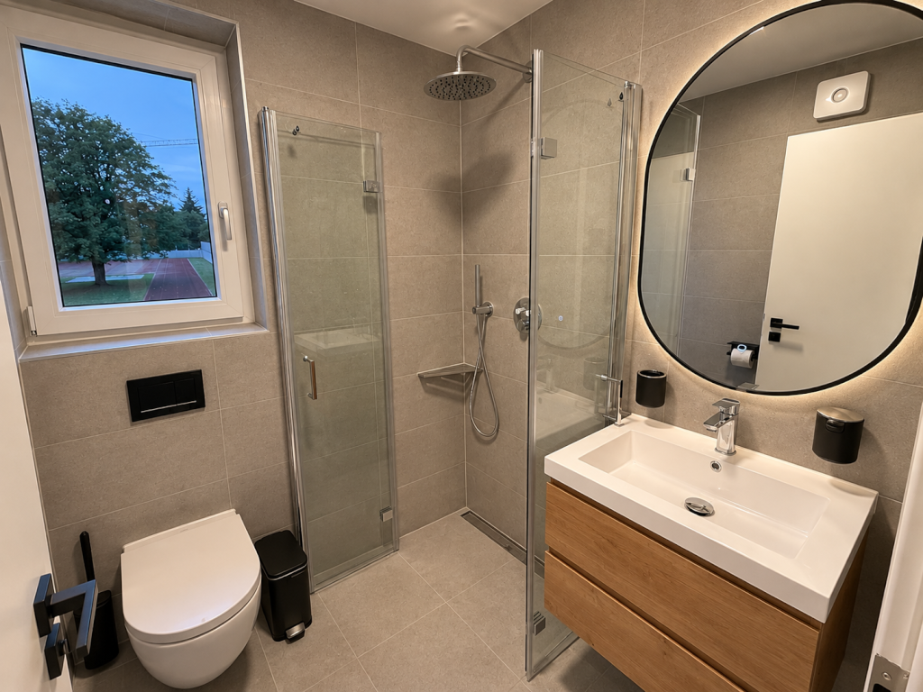 WG-Zimmer Berg am Laim Hansjakobstraße 112 - Modernes Bad mit bodengleicher Dusche